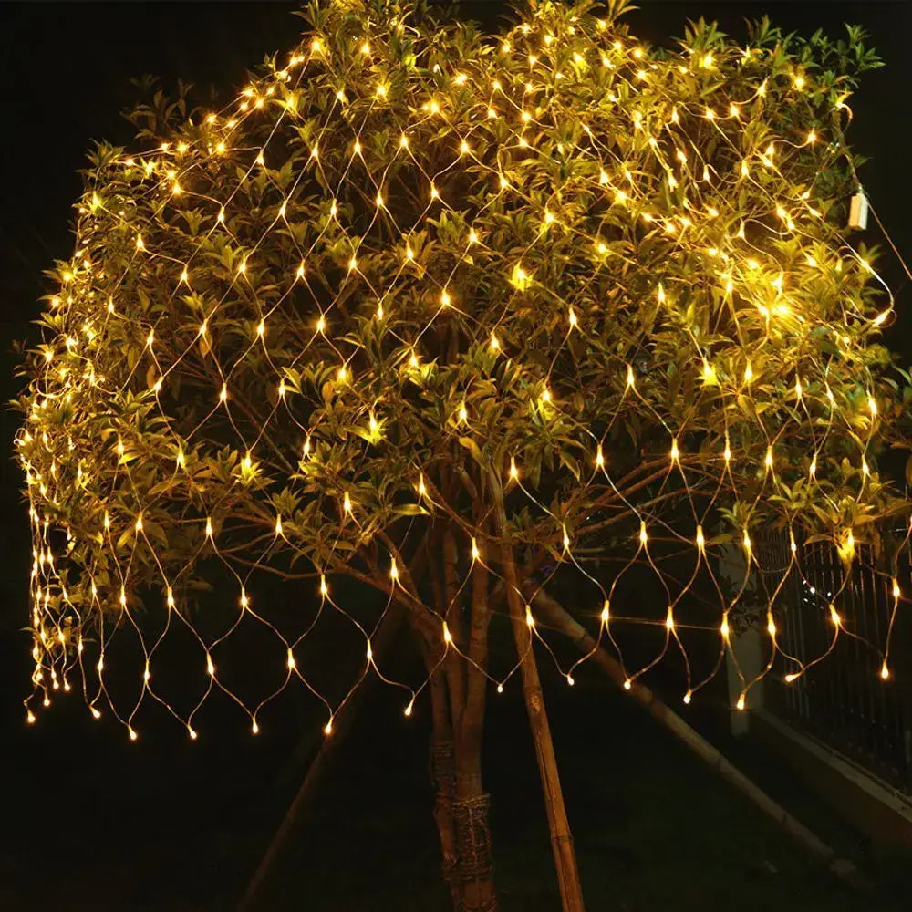 Decorbites led string lights warm golden netting pattern draped on outdoor tree for christmas festival party