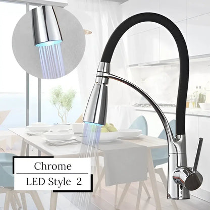 Chrome finished kitchen faucet with black flexible hose and led swivel pull spray head by DecorBites LED swivel