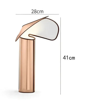 A sleek decorbites led table lamp with rose gold cylindrical base and curved glass shade for modern home decor