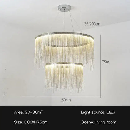 A modern two-tiered decorbites led tassel chandelier pendant light with golden led strands and chrome ceiling mount