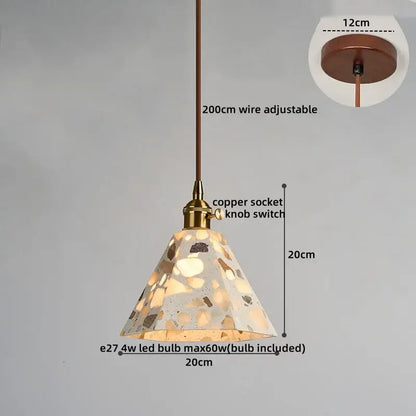 A warm-toned decorbites led terrazzo pendant light with a conical speckled glass shade and brass copper wire suspension