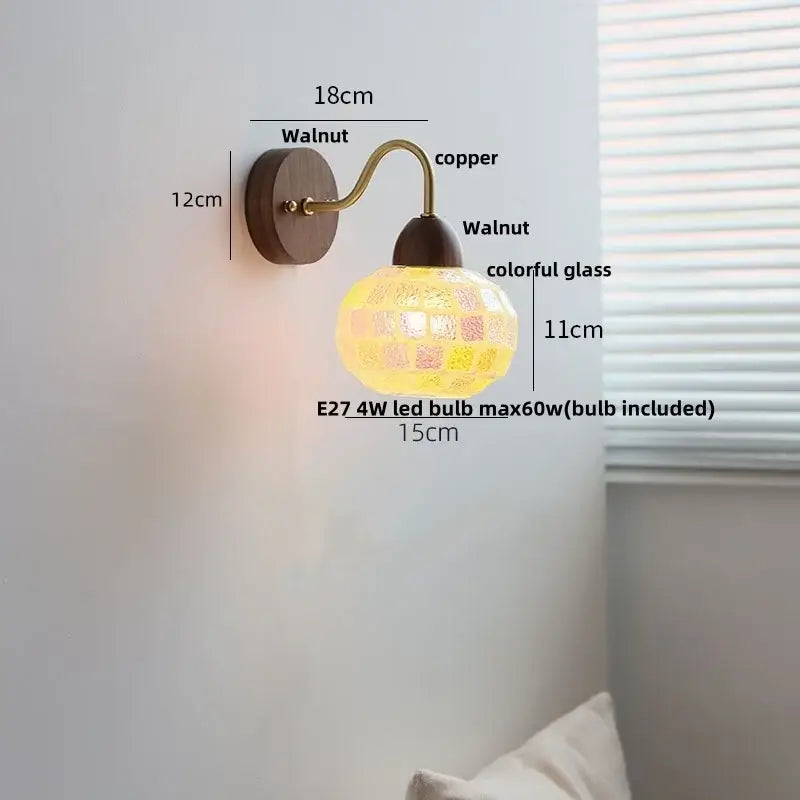 A warm-toned DecorBites led Tiffany style wall sconce with walnut base, copper arm, and colorful mosaic glass shade