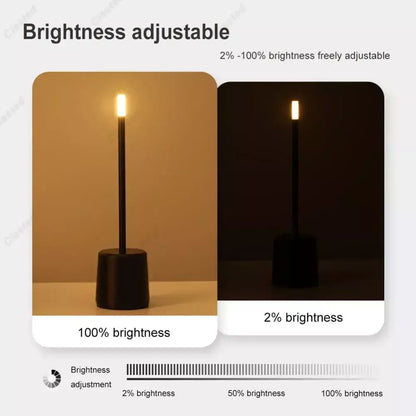 A sleek black cylindrical decorbites led touch table lamp with adjustable brightness from 2 to 100 percent