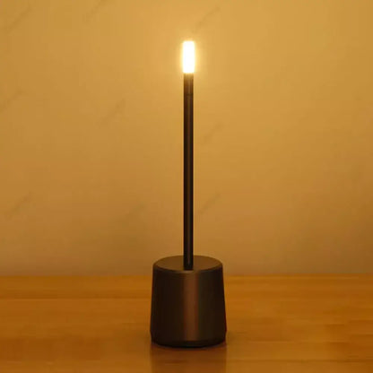 Black cylindrical decorbites led touch table lamp with warm glowing light and stepless dimming for home or hotel use