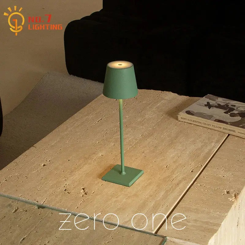 A sleek mint-green decorbites led touch table lamp with a matte metal base and usb charging for home or office use