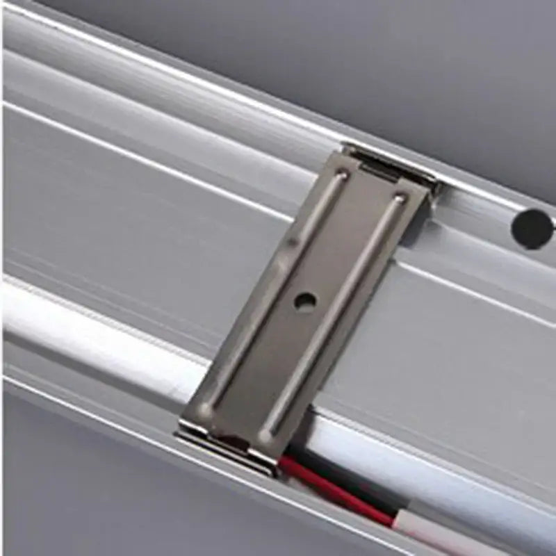 Silver metallic track mount bracket securing wiring in aluminum channel for decorbites led tri-proof batten tube light
