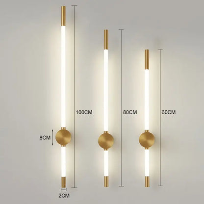 Gold-toned decorbites led tube wall lights with sleek cylindrical led tubes and minimalist circular black gold sconces