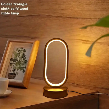 Decorbites led u-shaped bedroom bedside decorative lamp with golden triangle solid wood frame and warm led lighting