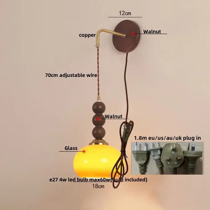 Decorbites led wall orange glass pendant light with warm yellow glass, copper mount, and dark walnut beads on wire