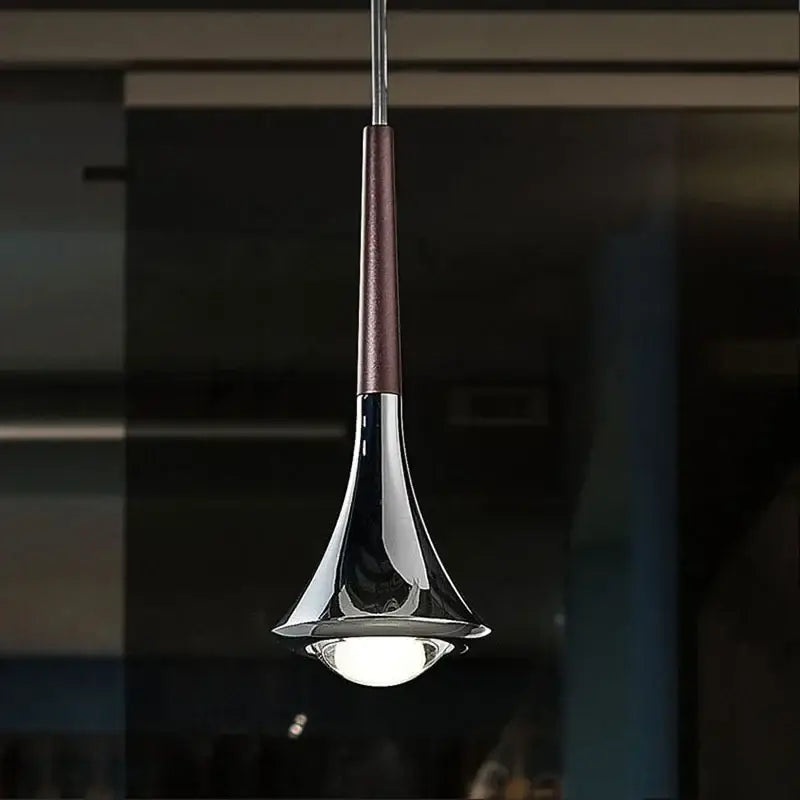 Modern decorbites chandelier with sleek chrome finish and dark brown wood accent in trumpet-shaped light luxury meteor design