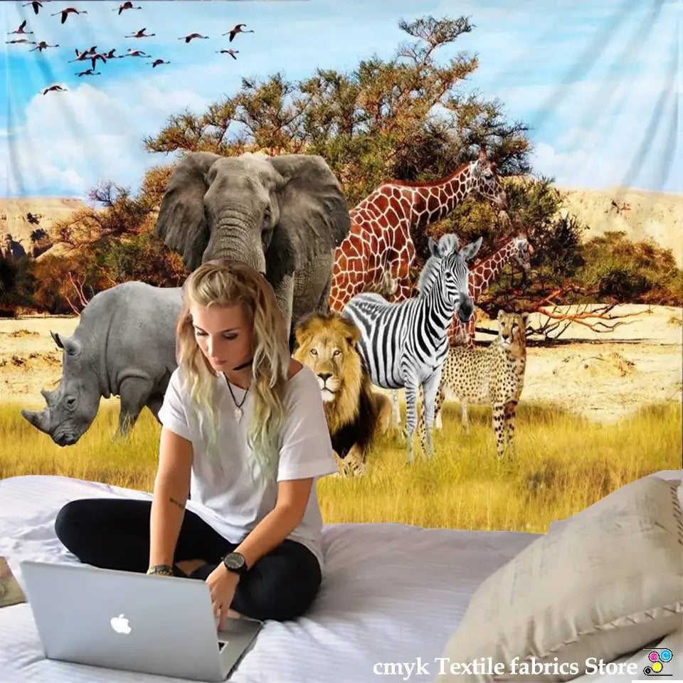 Silver apple laptop displayed next to decorbites lion tapestry featuring silver grassland animal design for bedroom decor