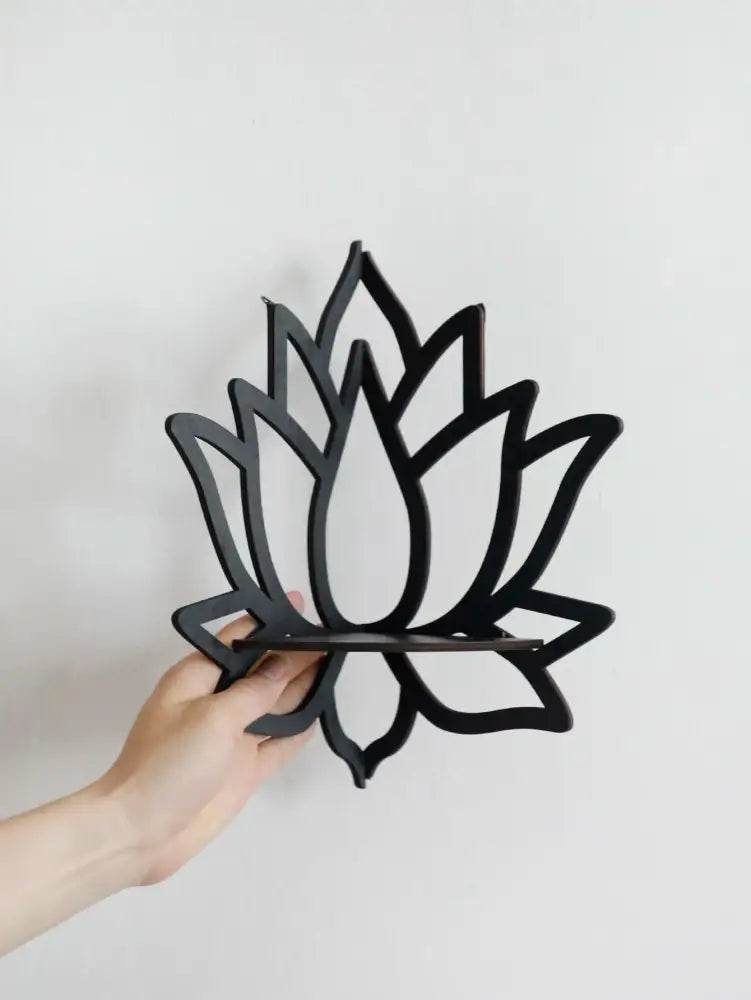 Black metal lotus floating wall shelf with layered petal design for elegant multi-style home decor by DecorBites™