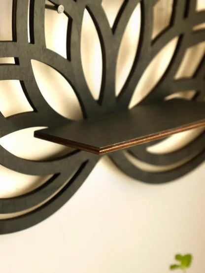 Black laser-cut wooden lotus floating wall shelf with petal design by DecorBites™ for multi-style home decor
