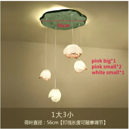 Decorbites lotus glass pendant lamp features a dark green leaf ceiling mount with one large pink and two white glass lampshades