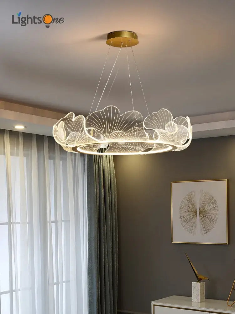 A modern decorbites lotus leaf chandelier with translucent acrylic petals and gold ceiling mount for living room lighting