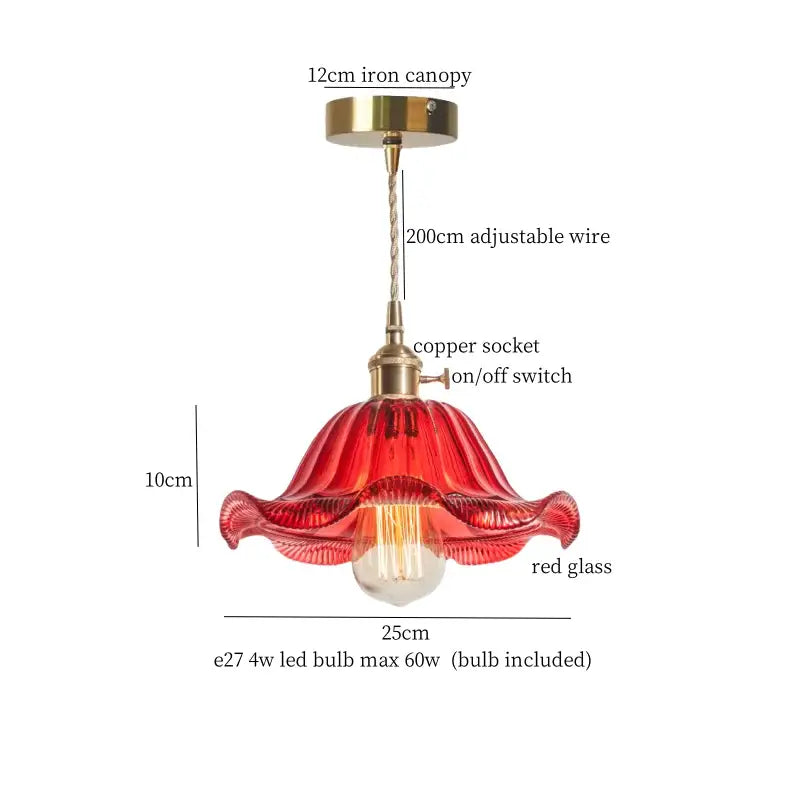 A vibrant red decorbites lotus leaf glass pendant light with fluted design and brass hardware for loft living spaces