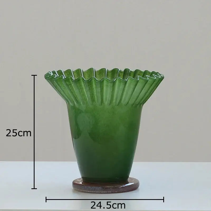 Glossy emerald green ceramic decorbites lotus leaf glass vase with fluted petal rim and rounded base for elegant decor