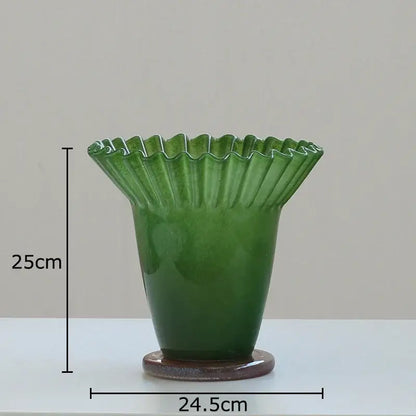 Glossy emerald green ceramic decorbites lotus leaf glass vase with fluted petal rim and rounded base for elegant decor