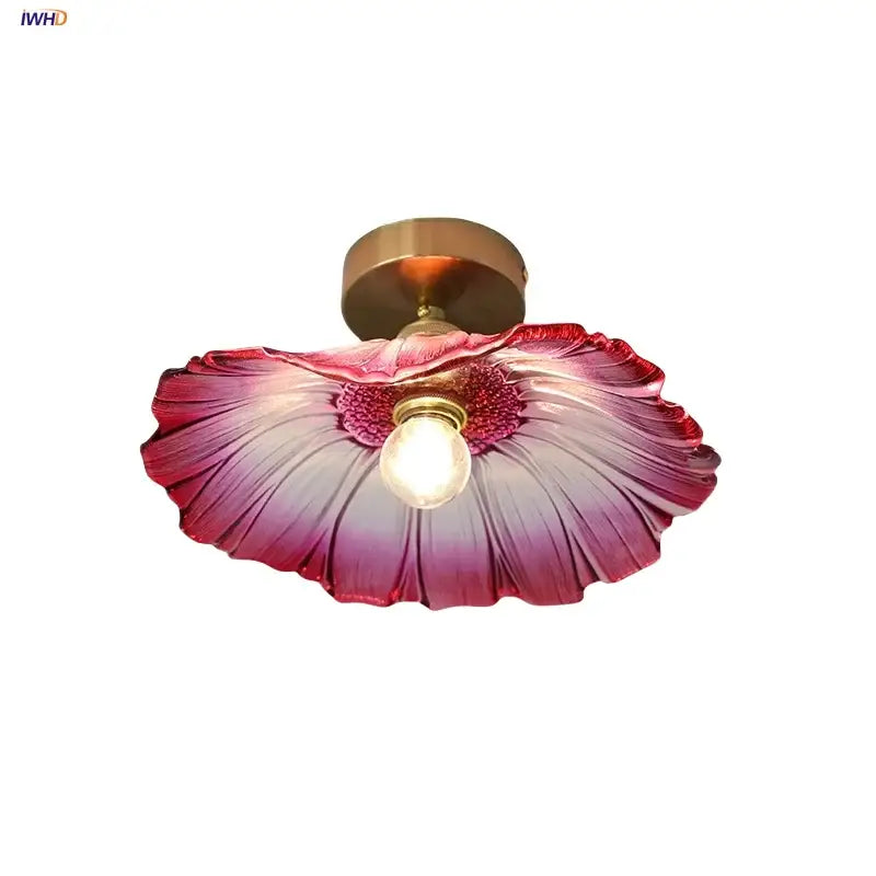 A vibrant pink and purple gradient glass decorbites lotus leaf led ceiling lamp with brass-finished mounting base