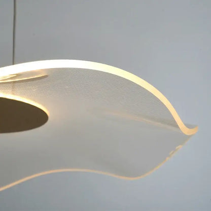 Modern minimalist decorbites lotus leaf pendant lights with translucent curved acrylic shade and warm LED illumination