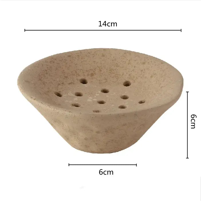 Beige lotus root clay soap dish with textured surface and drainage holes for elegant home decor use