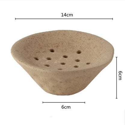 Beige lotus root clay soap dish with textured surface and drainage holes for elegant home decor use