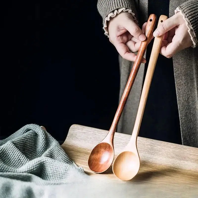 Two polished wooden spoons with rounded bowls from decorbites lotus wooden eco-friendly long handle salad utensils