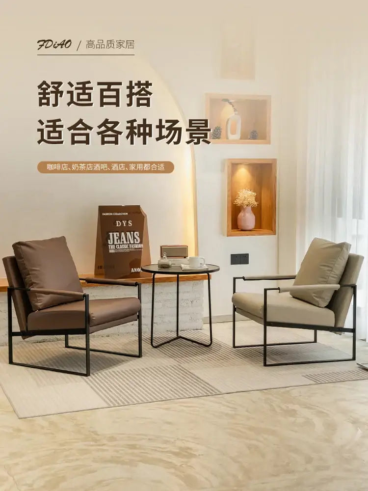 Modern brown leather lounge chair with black metal frame by DecorBites designed for casual comfort in various settings