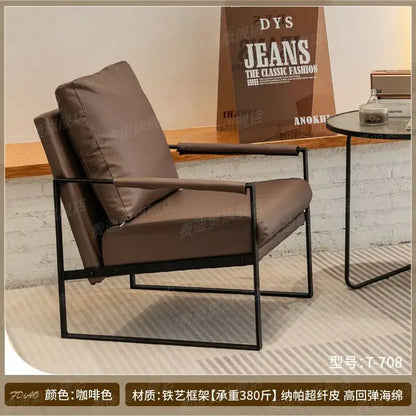Brown leather decorbites lounge chair with black metal frame ideal for coffee shop hotel balcony and reception area