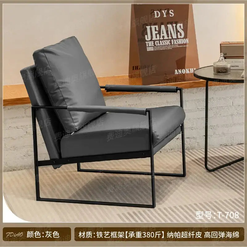 Gray leather decorbites lounge chair with black metal frame for casual comfort in coffee shop or hotel balcony