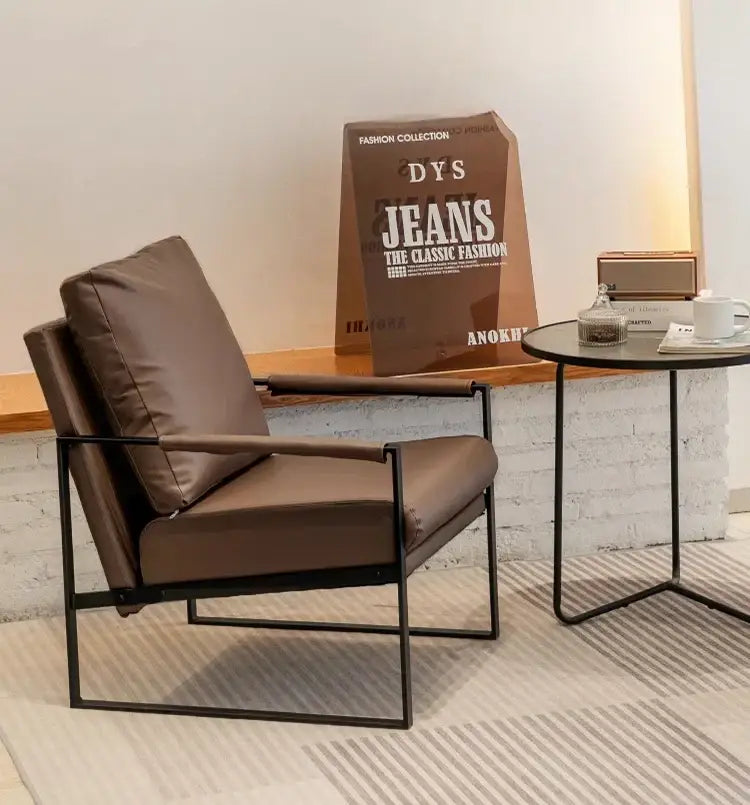 Brown leather single sofa chair with sleek black metal frame decorbites™ for coffee shop and hotel balcony use