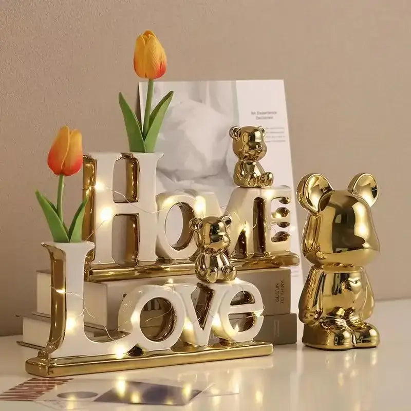 Gold-colored bear 3d ceramic figurines with tulip and illuminated home and love lettering by DecorBites love bear