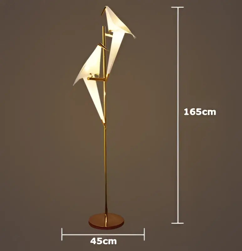 Gold-finished floor lamp with white origami paper wings from decorbites love bird chandelier for elegant dining rooms