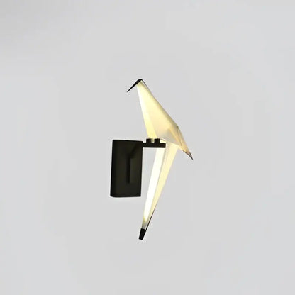 A decorbites love bird chandelier lighting fixture with translucent white wings and black base for elegant dining room decor