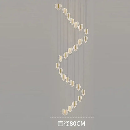 A modern decorbites love chandelier with translucent white heart-shaped crystals and gold accents for living rooms and staircases