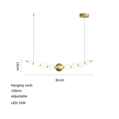 A modern brass decorbites love gold chrome chandelier with spherical bulb and frosted glass orbs on adjustable cord