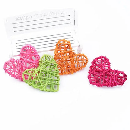 Colorful decorbites love heart decorations woven in pink green and orange for wedding valentines and scrapbooking use