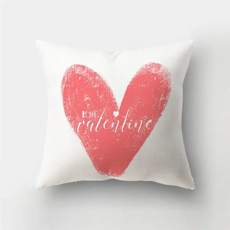 White throw pillow cover with textured coral pink love heart print and be my valentine script for sofa decor