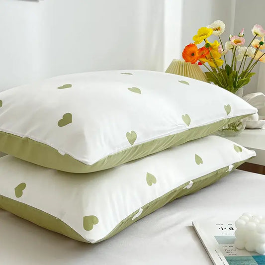 Decorbites love printed pillowcase set features white fabric with light green heart patterns and olive-green piping detail