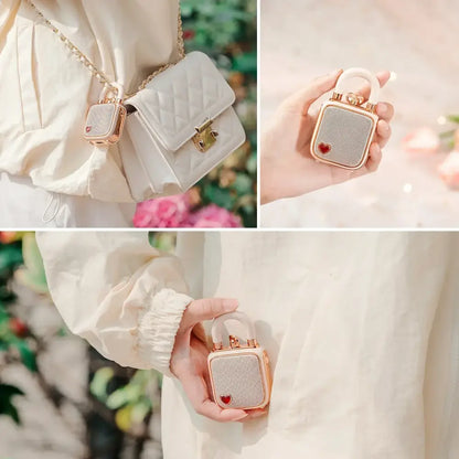A rose gold-framed lovelock mini bluetooth speaker with quilted white body and red heart emblem decorbites pink design
