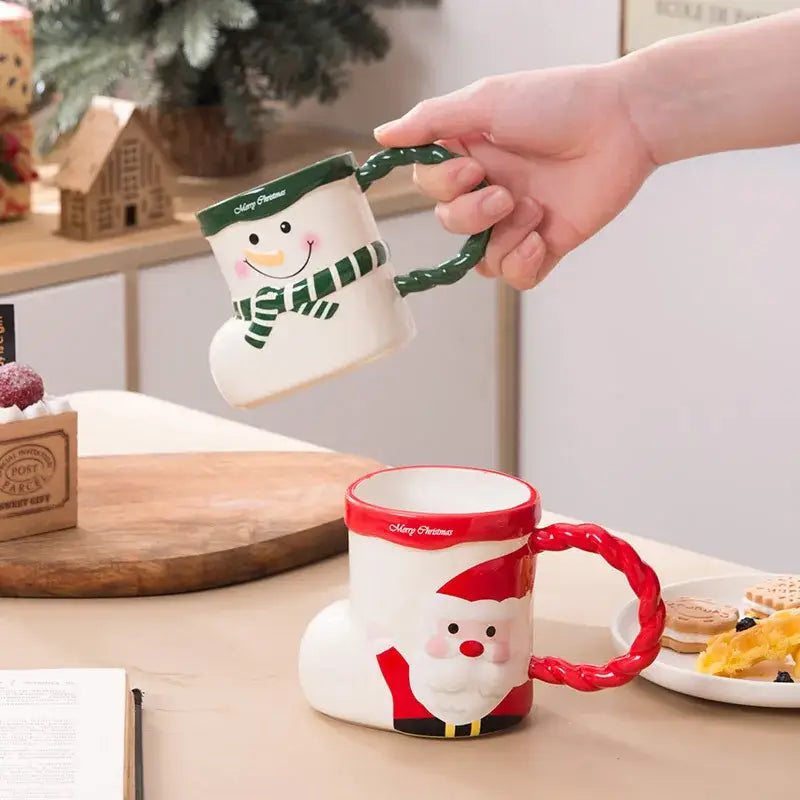 White ceramic christmas socks ceramic mug shaped like snowman with green handle and merry christmas text on rim decorbites lovely christmas