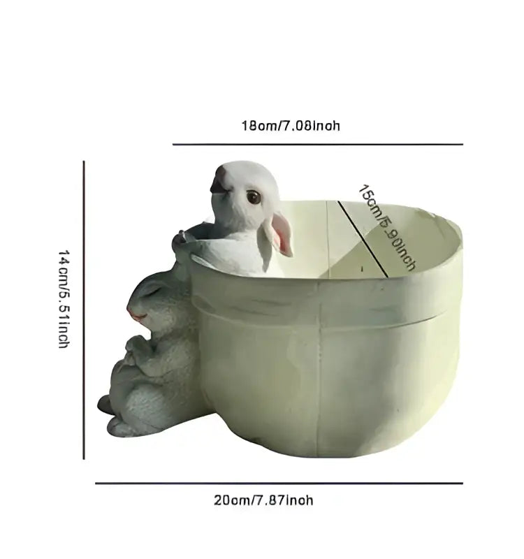 White ceramic rabbit garden flowerpot with three sculpted rabbits for lovely rabbit garden decor and balcony use