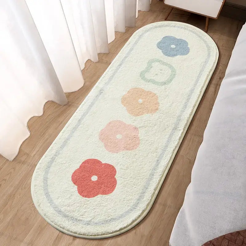 DecorBites lovely rabbit pink bedside rug is a cream oval bath mat with pastel blue green peach and coral floral designs