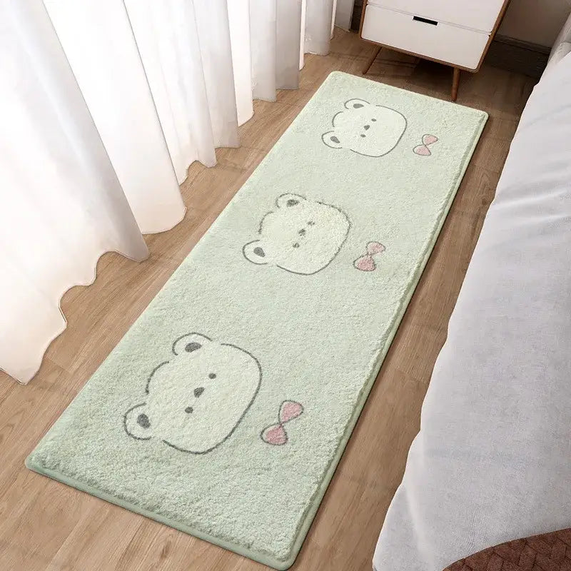 A soft mint green plush bath mat with three cute bear faces and pink bows for decorbites lovely rabbit bedside use