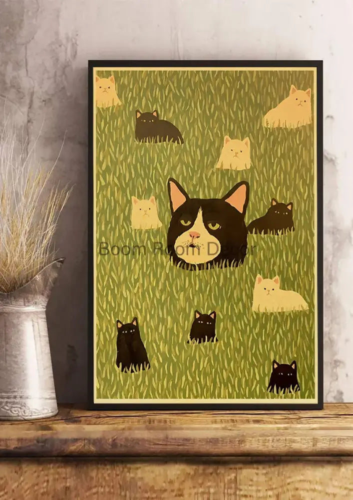 A framed DecorBites™ lover cat paper poster featuring a stylized black and white cat with smaller cats on green grass