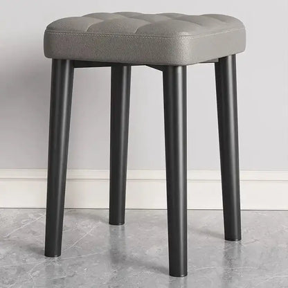 Gray tufted faux leather decorbites low square stool bench with sleek black metal legs for dining and kitchen use