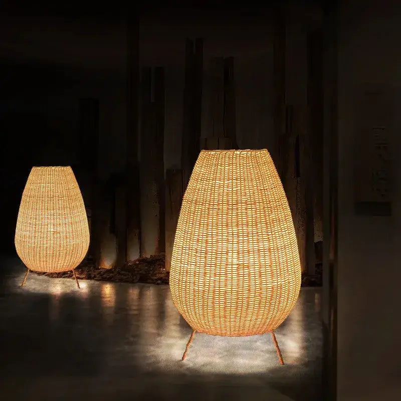 Warm-toned decorbites lucide colin rattan floor lamp with teardrop shape and slender metal legs for indoor use