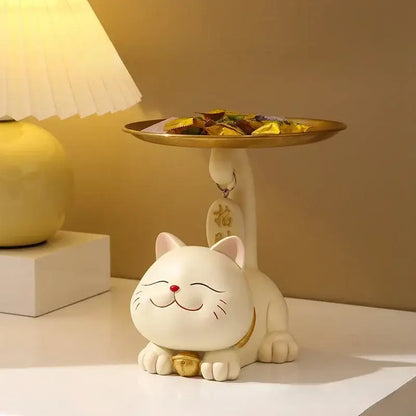 White ceramic DecorBites lucky cat statue with gold accents and golden tray for home decor and storage