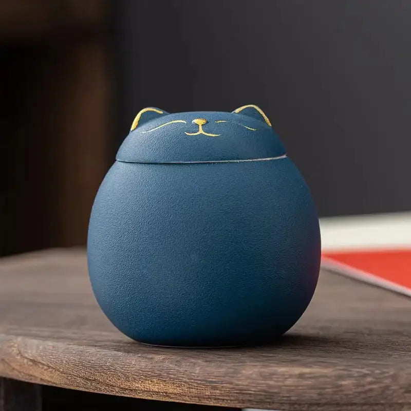 DecorBites™ lucky cat navy blue ceramic tea storage jar with gold-trimmed ears for household tea and candy storage