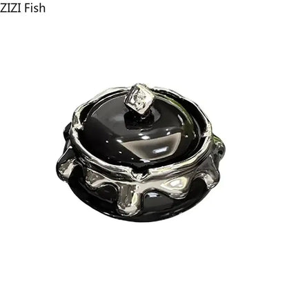Black ceramic ashtray with silver metallic rim and diamond-shaped knob by DecorBites lucky ceramic ashtray